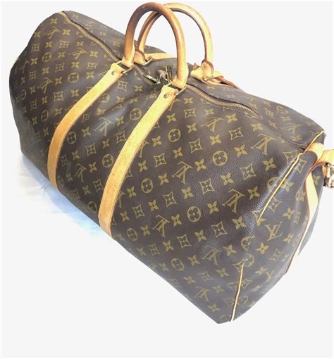 louis vuitton wheeled duffle bag|louis vuitton duffle bag vintage.